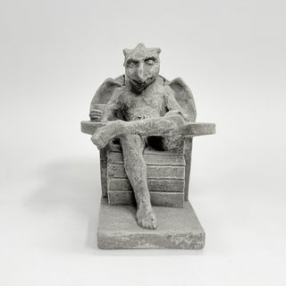 Front view of a happy gargoyle, leaned back in an Adirondack chair with a drink in his hand on a white background. Laid back, relaxed, happy gargoyle House Parts home decor handmade Atlanta gargoyle grotesque whimsical fantasy mystical creature. Unique gift for fans of fantasy, dungeon, or dinosaurs. Unique Christmas gift for someone who has everything or fantasy lovers. Gothic, medieval, unique, artisan, craft, detail, specialty, a gift that no one else has, special