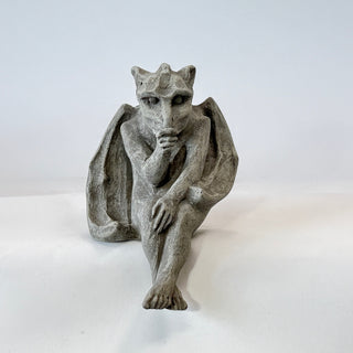 Front facing Seated Baby Gargoyle sucking on his thumb. Cute, funny and whimsical. House Parts home decor handmade Atlanta gargoyle grotesque whimsical fantasy mystical creature. Unique gift for fans of fantasy, dungeon, or dinosaurs. Unique Christmas gift for someone who has everything. Gothic, medieval, unique, artisan, craft, detail, specialty, a gift that no one else has, special, protective, female owned business, family small business, local, odd, quirky gifts