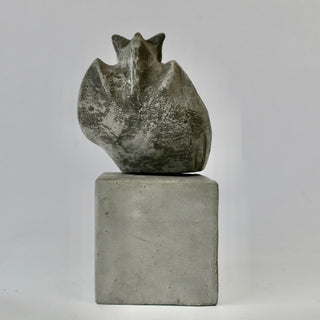 Reverse view of a Seated Baby Gargoyle sucking on his thumb. The baby is sitting on a cement cube. Cute, funny and whimsical. House Parts home decor handmade Atlanta gargoyle grotesque whimsical fantasy mystical creature. Unique gift for fans of fantasy, dungeon, or dinosaurs. Unique Christmas gift for someone who has everything or fantasy lovers. Gothic, medieval, unique, artisan, craft, detail, specialty, a gift that no one else has, special, protective