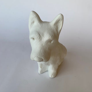 A white plaster sculpture of a Terrier sitting on his hind legs as he looks upward.  
Set on a white background

House Parts handmade, crafted, artisan, high quality, statues, busts, and figurines.  Unique gifts for everyone. Indoor decorations, Outdoor statues and garden items. Thoughtful gift, animal lovers, rabbit lovers, instead of pet, small business rabbit, bunny, dog, turtle, frog, clam shell, animal lover gifts, pet memorial