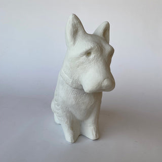 Turned slightly is a white plaster sculpture of a Terrier sitting on his hind legs as he looks upward.  Set on a white background

House Parts handmade, crafted, artisan, high quality, statues, busts, and figurines.  Unique gifts for everyone. Indoor decorations, Outdoor statues and garden items. Thoughtful gift, animal lovers, rabbit lovers, instead of pet, small business rabbit, bunny, dog, turtle, frog, clam shell, animal lover gifts, pet memorial