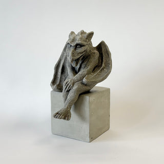 Concrete gargoyle sculpture on a white block against a white background

House Parts handmade, crafted, artisan, high quality, statues, busts, and garden and animal figurines.  Unique gifts for everyone. Indoor decorations, Outdoor statues and garden items. Fantasy, whimsical, thoughtful gifts, original gift idea, shop small business, plaster, concrete, Clam shell, Gargoyles, Alice in Wonderland, animal lover gifts, pet memorial