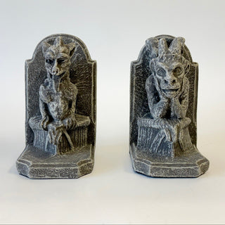 Facing forward A pair of gothic gargoyles bookends sitting on a throne or a chair on a white background
House Parts home decor handmade Atlanta gargoyle grotesque whimsical fantasy mystical creature. Unique gift for fans of fantasy, dungeon, or dinosaurs. Unique Christmas gift for someone who has everything or fantasy lovers. Gothic, medieval, unique, artisan, craft, detail, specialty, a gift that no one else has, special, protective
