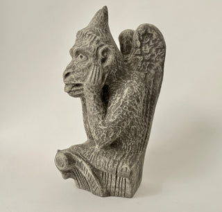 Side view of a Gargoyle figurine has his hands on his face and is deep in thought.  The figurine is on a white background. House Parts home decor handmade Atlanta gargoyle grotesque whimsical fantasy mystical creature. Unique gift for fans of fantasy, dungeon, or dinosaurs. Unique Christmas gift for someone who has everything. Gothic, medieval, unique, artisan, craft, detail, specialty, a gift that no one else has, special, protective, female owned business, family small business, local, odd, quirky gifts
