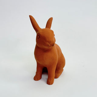 Terracotta sitting rabbit figurine on a white background. Ears extended and alert. ready to hop away from danger

House Parts handmade, crafted, artisan, high quality, statues, busts, and figurines.  Unique gifts for everyone. Indoor decorations, Outdoor statues and garden items. Thoughtful gift, animal lovers, rabbit lovers, instead of pet, small business, female owned family business, rabbit, bunny, dog, turtle, frog, clam shell