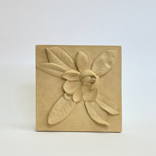 A plaster cast of a Magnolia bud with leaf details, designed as wall art for home decor. For contrast, the plaque is set against a white background

House Parts handmade, crafted, artisan, high quality, statues, busts, and garden and animal figurines.  Unique gifts for everyone. Indoor decorations, Outdoor statues and garden items. Fantasy, whimsical, thoughtful gifts, original gift idea, shop small business, plaster, concrete, Clam shell, Gargoyles, Alice in Wonderland, animal lover gifts, pet memorial