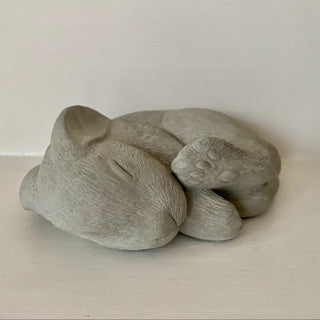 Plaster sculpture of a bunny sleeping on its side. His leg is playfully in the air as if he is dreaming. The bunny is on a white background
House Parts handmade, crafted, artisan, high quality, statues, busts, and figurines.  Unique gifts for everyone. Indoor decorations, Outdoor statues and garden items. Thoughtful gift, animal lovers, rabbit lovers, instead of pet, small business, female owned family business, rabbit, bunny, dog, turtle, frog, clam shell
