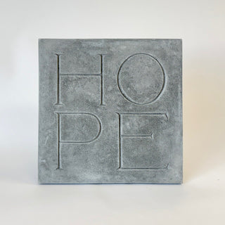 A rectangular concrete path stone with the word 'Hope' carved on it, placed on a white background. A beautiful message for all.

House Parts handmade, crafted, artisan, high quality, statues, busts, and garden and animal figurines.  Unique gifts for everyone. Indoor decorations, Outdoor statues and garden items. Fantasy, whimsical, thoughtful gifts, original gift idea, shop small business, plaster, concrete, Clam shell, Gargoyles, Alice in Wonderland, animal lover gifts, pet memorial